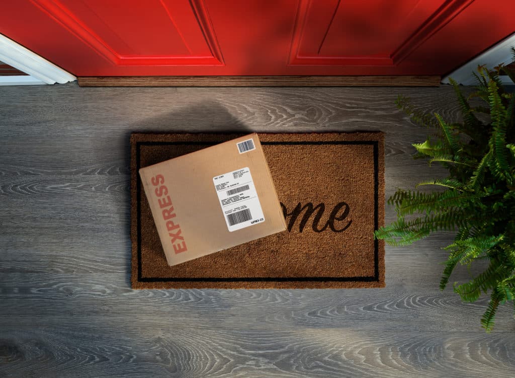 Expedited delivery box outside front door. Overhead view - Nerds That Care Rapid Recovery and Deployment - Backup